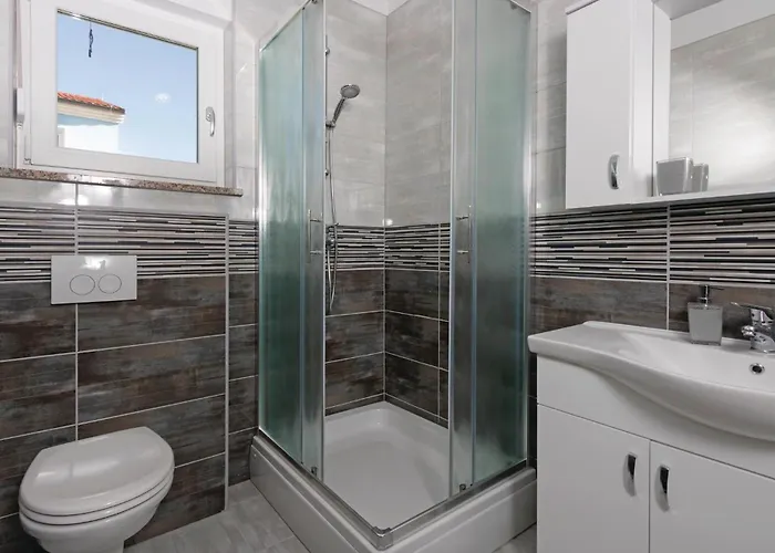 Four-bedroom In Hébergement de vacances Vodnjan